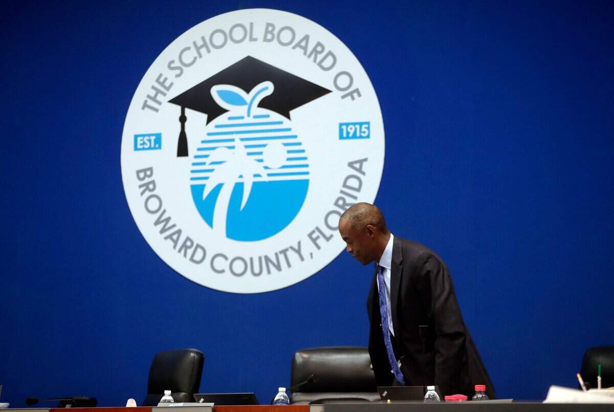 Now former Broward County Schools Superintendent Robert Runcie gets up during a break of a meeting of the Broward County School Board on March 5, 2019, in Fort Lauderdale, Fla.