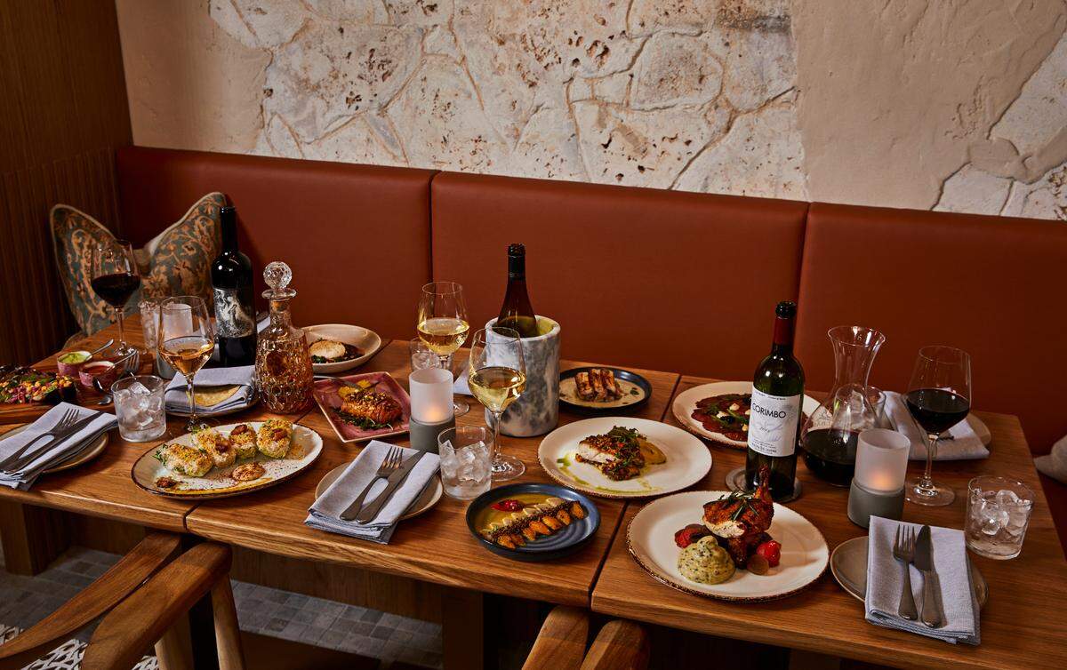 An vibrant dinner spread at Vinya Table.