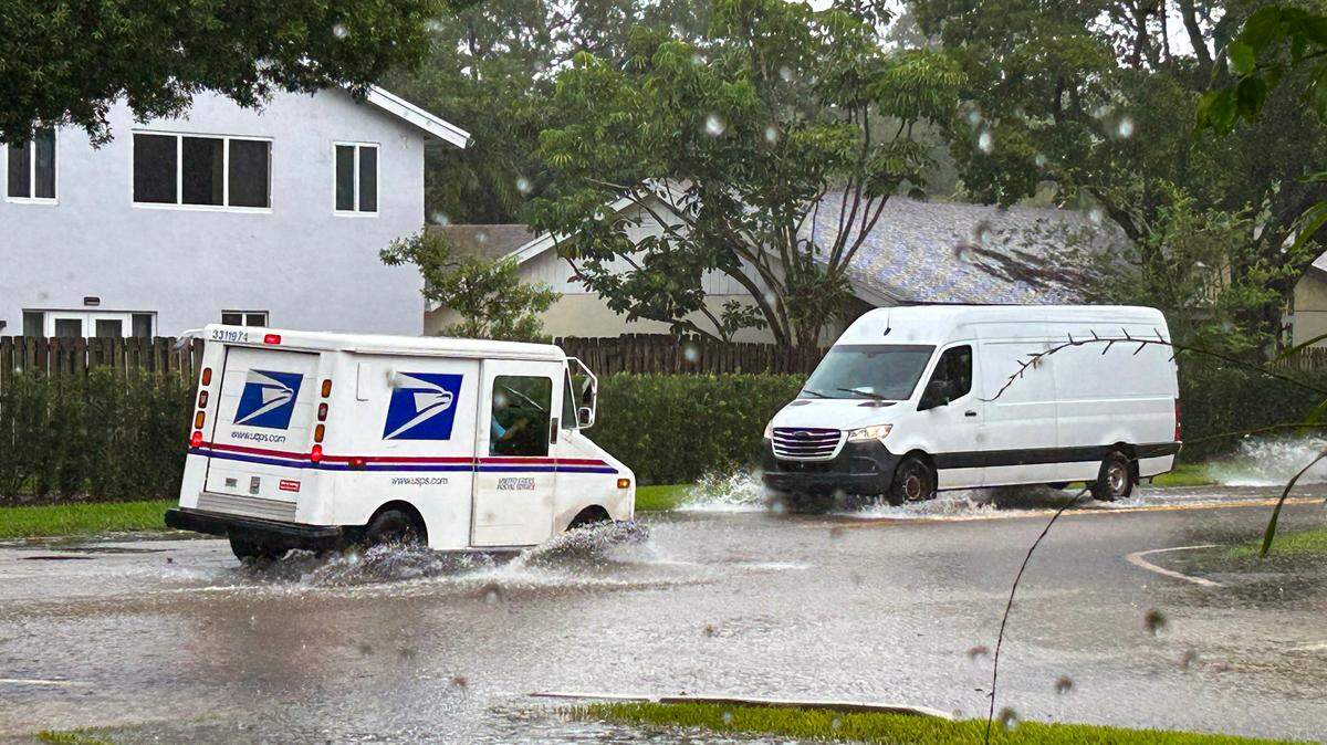 Street flooding on Monday afternoon, April 17, 2023, in the Rock Creek subdivision of Cooper City in western Broward County. Thunderstorms dropped more heavy rain on already saturated ground.