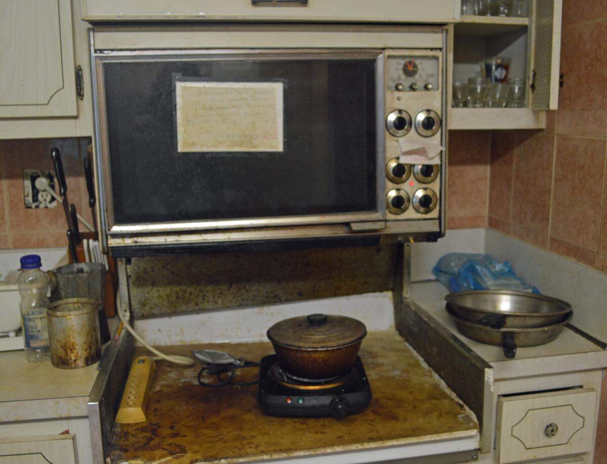 The stove in Orlando Bello’s apartment stopped working years ago, so he cooks his meals over a hotplate.