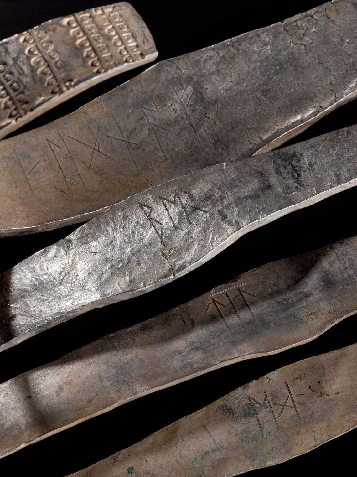 Arm bands in the hoard were inscribed with runes, some with the names of the bands’ owners, officials said.