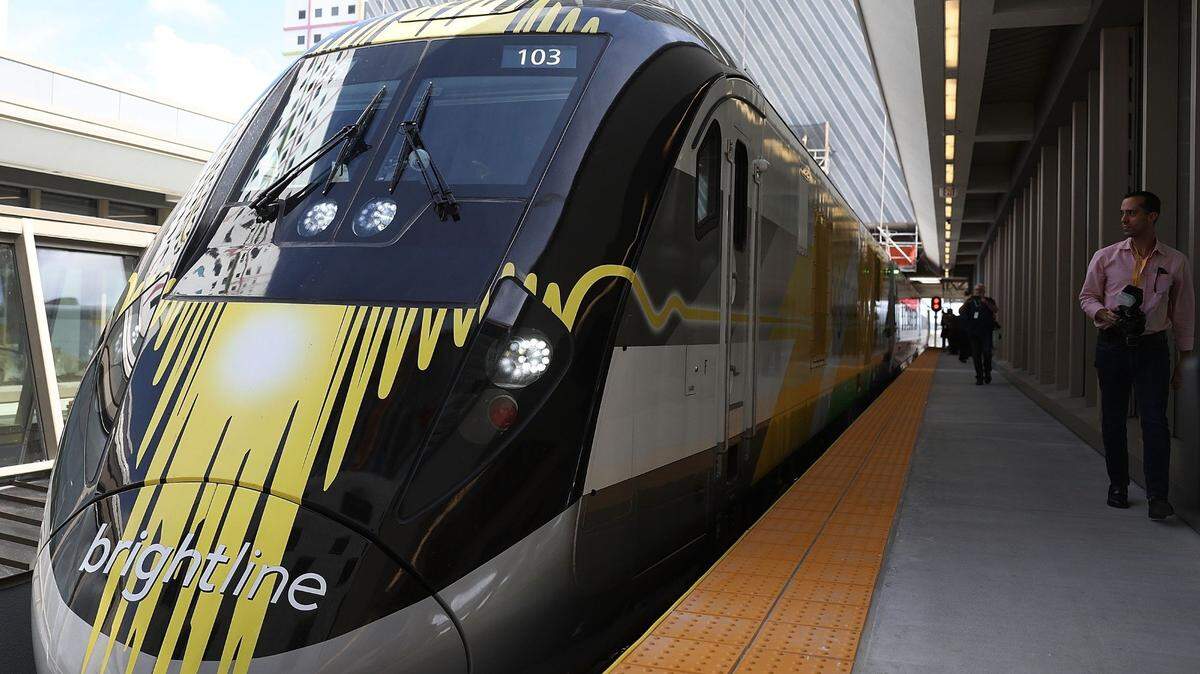 MIAMI, FL - MAY 11:  The Brightline train is seen at the new MiamiCentral terminal during the inaugural trip from Miami to West Palm Beach on May 11, 2018 in Miami, Florida. Brightline welcomed the media, politicians and other dignitaries to ride on the inaugural trip for the privately funded passenger train which is running from Miami to West Palm Beach with one stop in Fort Lauderdale. The $3.1 billion project, will eventually extend its rail system to Orlando International Airport and is scheduled to be completed by January 2021.  (Photo by Joe Raedle/Getty Images)