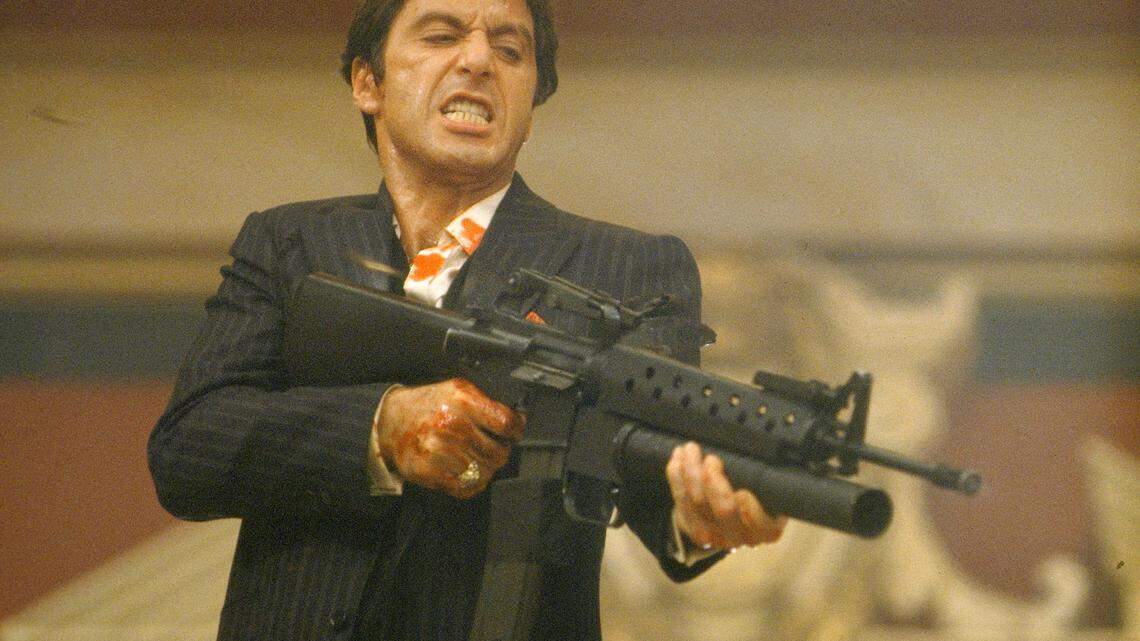 In this film image released by Universal Studios Home Entertainment, Al Pacino portrays Tony Montana, a Cuban immigrant turned kingpin, in a scene from 1983's  "Scarface."