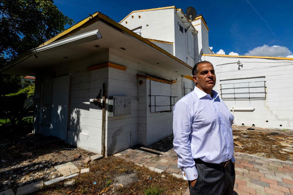 Anthony Accetta stands outside 1800 Michigan Ave, the home he hopes to demolish and then sell to developers. He said the proposed house that would take its place would be at least four feet higher in elevation, and more flood-resilient.