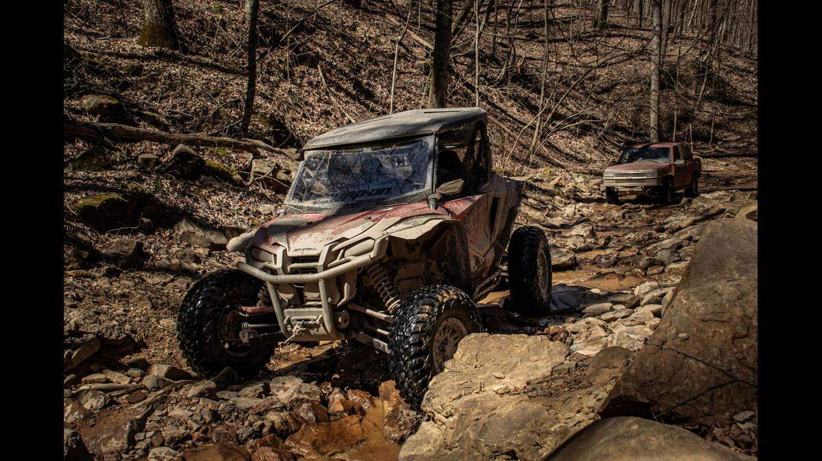 Two adults were killed and 7 children injured after their ATV (not the one pictured) crashed and rolled at an ATV park in Alabama, officials say.