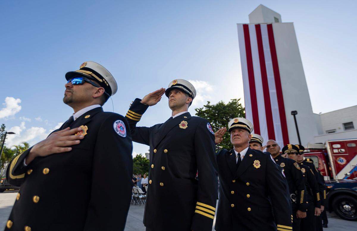 Miami Beach Firefighters attend a September 11, 2001, remembrance ceremony at Fire Station 2 on Monday, Sept. 11, 2023, in Miami Beach, Fla.
