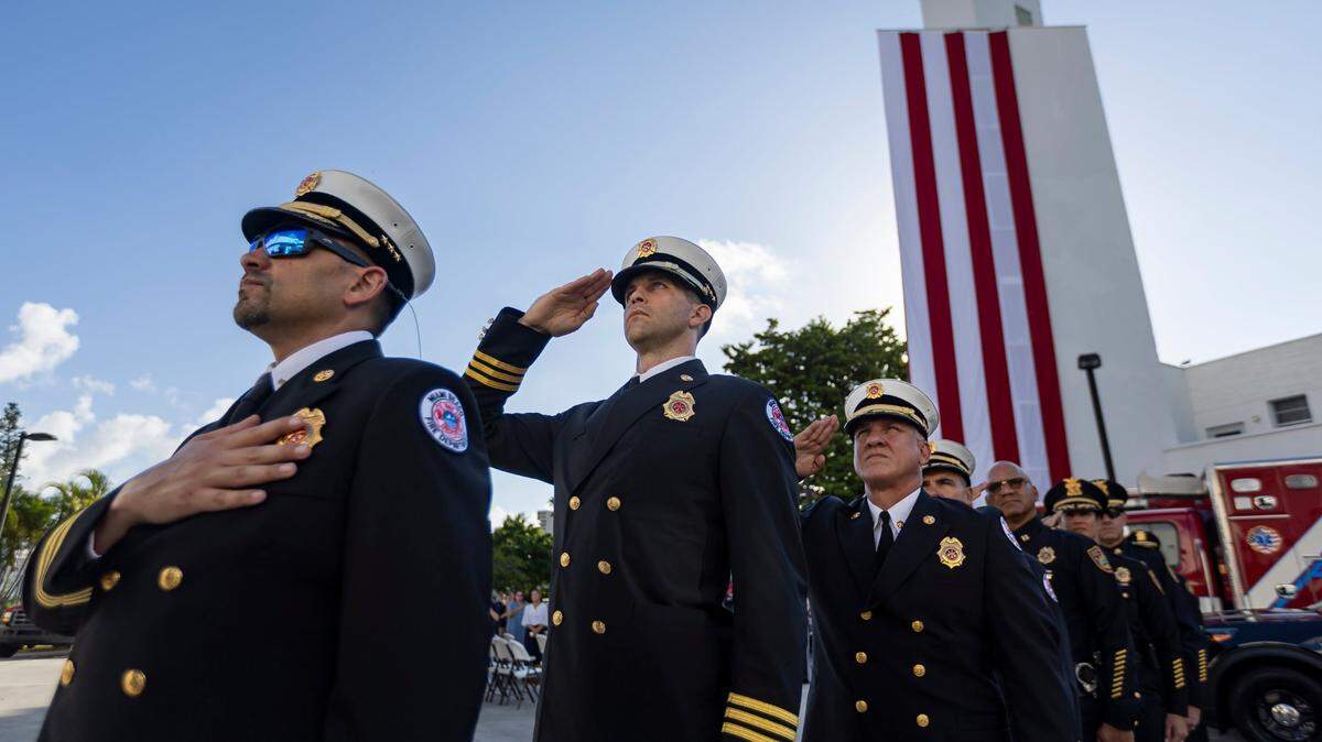 Miami Beach Firefighters attend a September 11, 2001, remembrance ceremony at Fire Station 2 on Monday, Sept. 11, 2023, in Miami Beach, Fla.