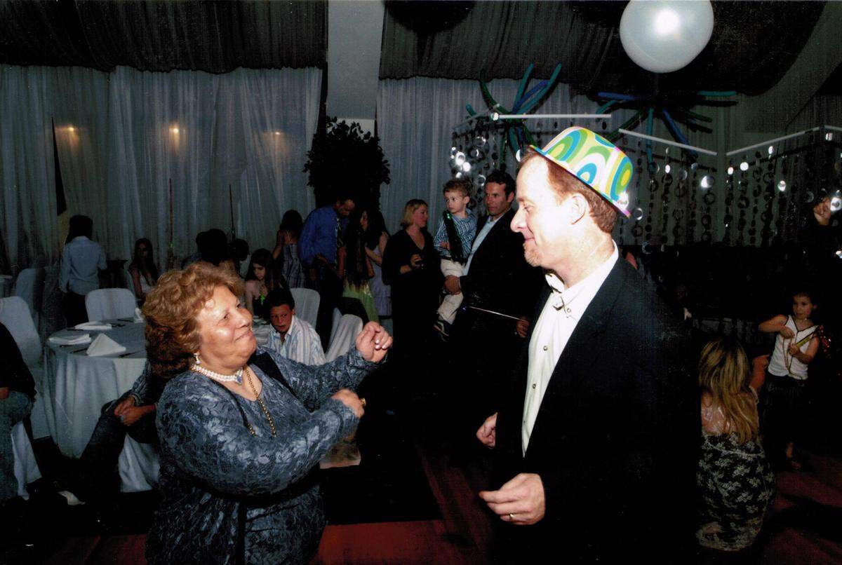Shula Ben-David dances with Robert Kirkpatrick at his son Jesse’s Bar Mitzvah in 2006. Shula was director&nbsp;of Bar/Bat Mitzvah Emerita at Temple Beth Sholom until she retired in 2011. She died Nov. 14, 2021.