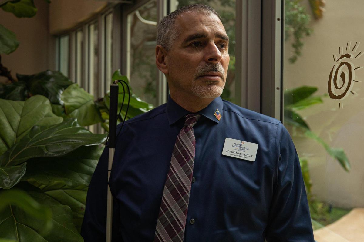 Manager of Technology Jorge Hernandez poses for a portrait at Miami Lighthouse for the Blind and Visually Impaired on Oct. 13, 2022.
