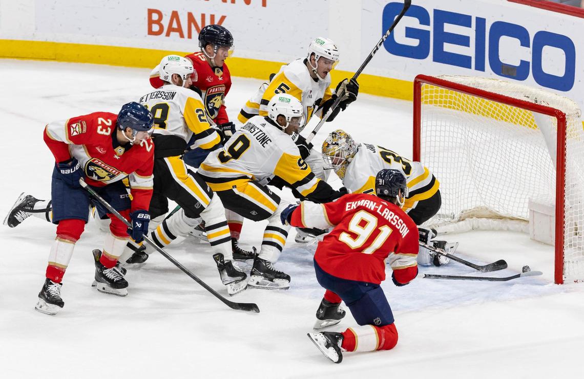 Florida Panthers defenseman Oliver Ekman-Larsson (91) scores a goal against the Pittsburgh Penguins in the second period of their NHL game at the Amerant Bank Arena on Friday, Dec. 8, 2023, in Sunrise, Fla.