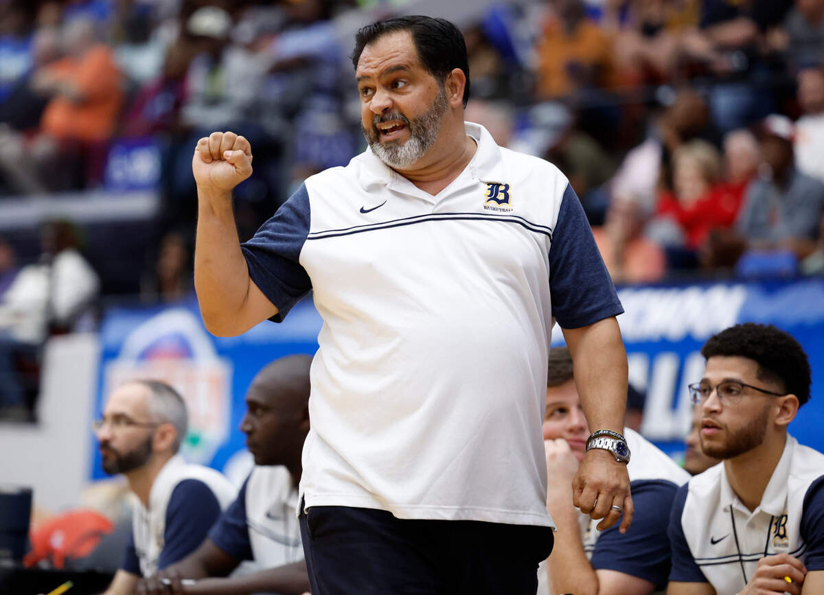Belen Jesuit coach Gaston “Chachi” Rodriguez gestures towards the court in the game against Mainland during the FHSAA boys basketball Class 5A State Championship at the RP Funding Center in Lakeland, Florida on Saturday, March 4, 2023.