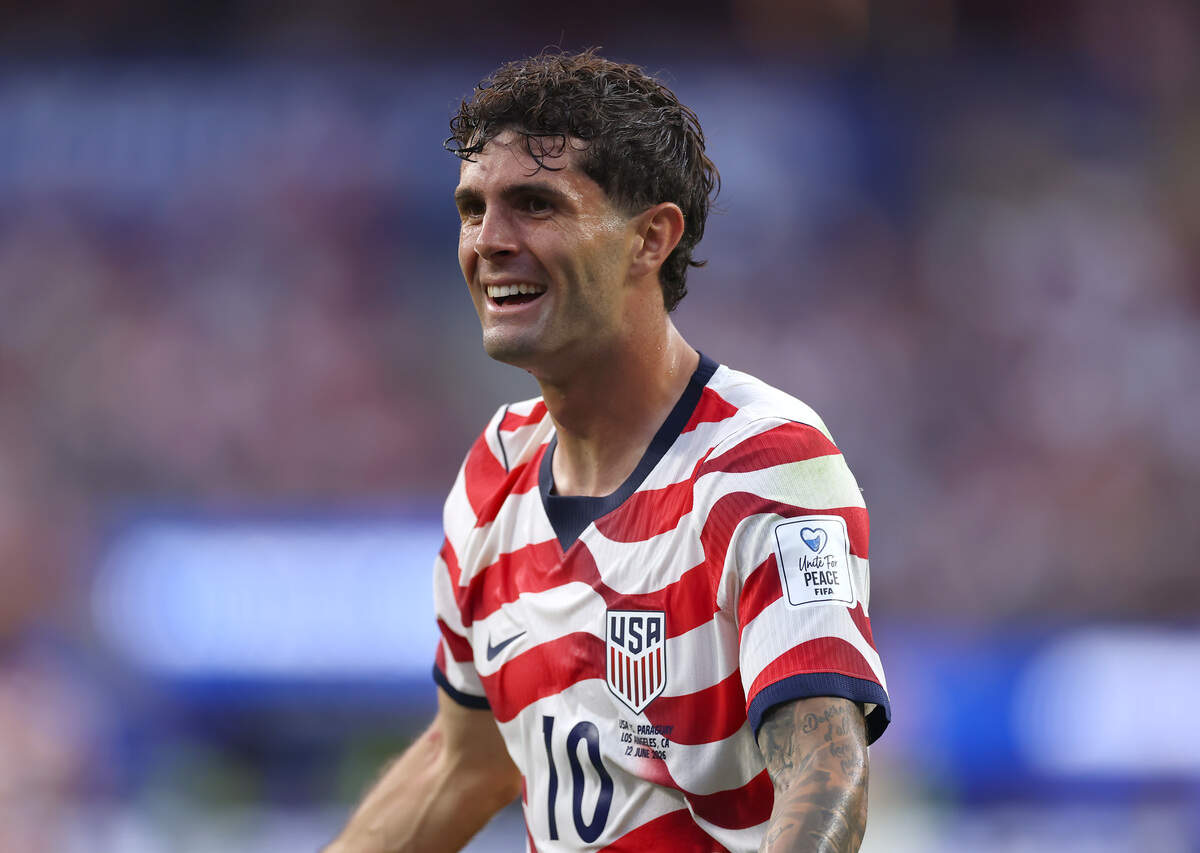 LOS ANGELES, CALIFORNIA - JUNE 12: Christian Pulisic #10 of the United States smiles during the FIFA World Cup 2026 Group D match between USA and Paraguay at Los Angeles Stadium on June 12, 2026 in Los Angeles, California. (Photo by Dean Mouhtaropoulos/Getty Images)