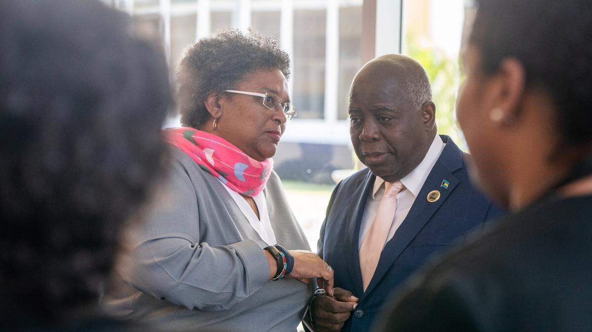 Barbados Prime Minister Mia Mottley, left, speaks with Bahamas Prime Minister Philip Davis during the 44th regular meeting of the Caribbean Community leaders in Nassau, Bahamas, during a three-day summit. in February 2023