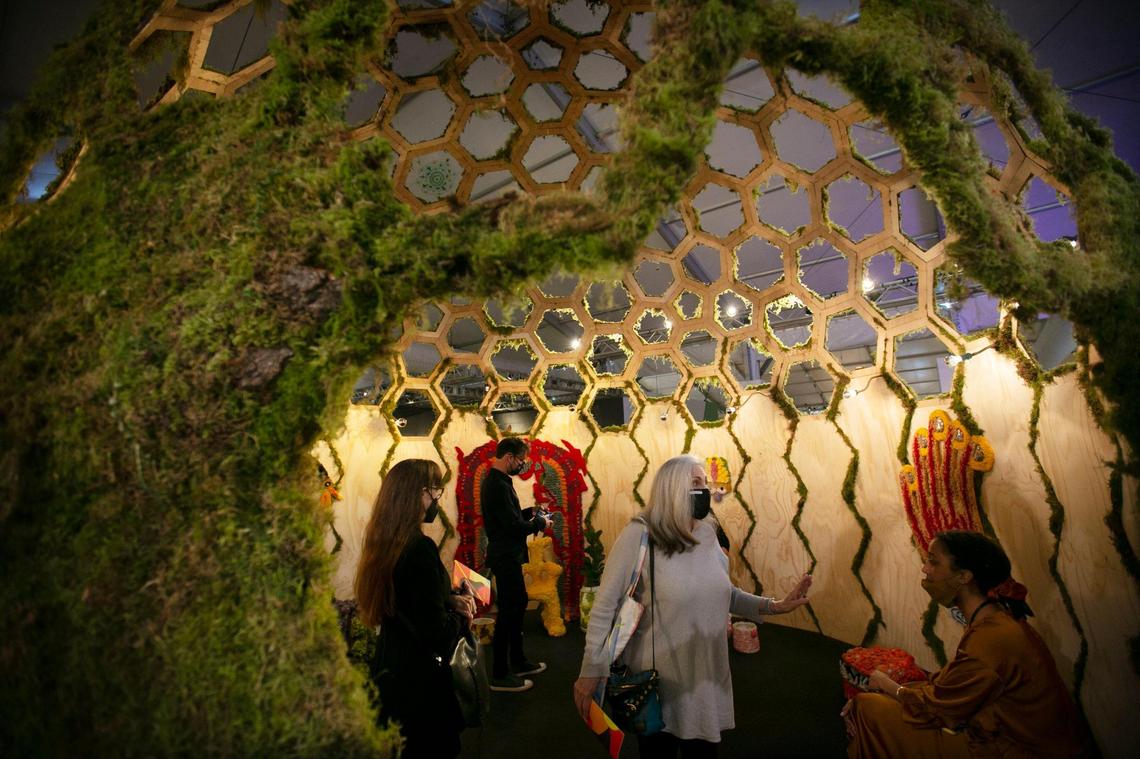 Design Miami fair attendees explore the interior of a piece called the Dome, by artist Rem Denizen. 