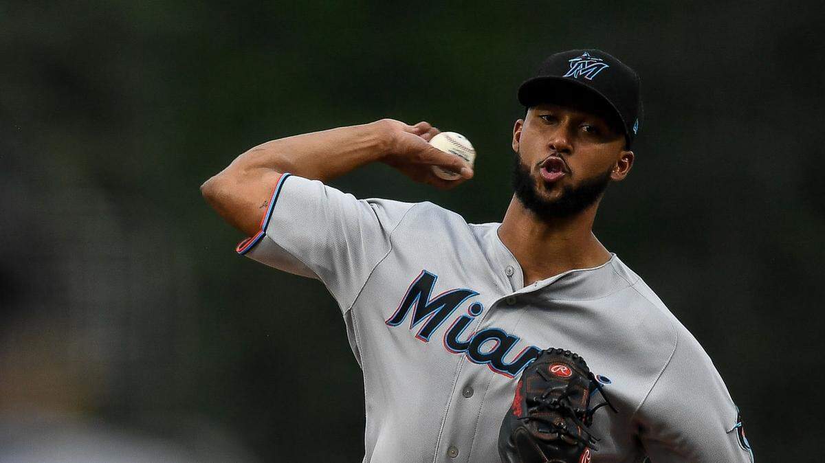 Miami Marlins’ Sandy Alcantara pitches against the Colorado Rockies at Coors Field on Aug. 16, 2019, in Denver, Colorado.