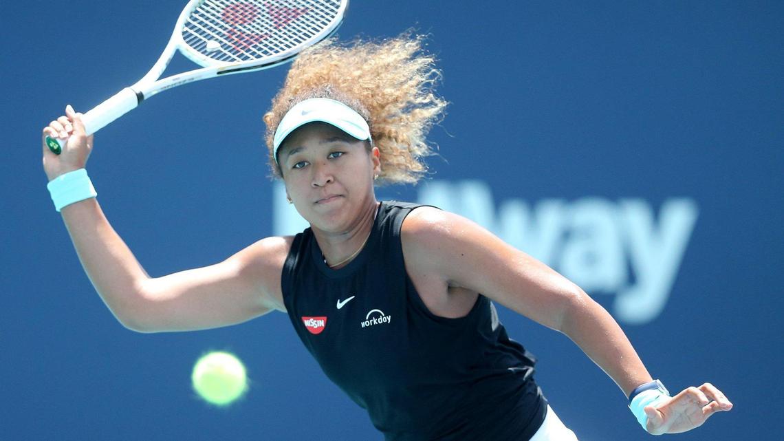 Naomi Osaka tries to chase down a forehand during her loss to Maria Sakkari in the quarterfinals of the 2021 Miami Open. She plays her 2022 tournament opening match on Wednesday.