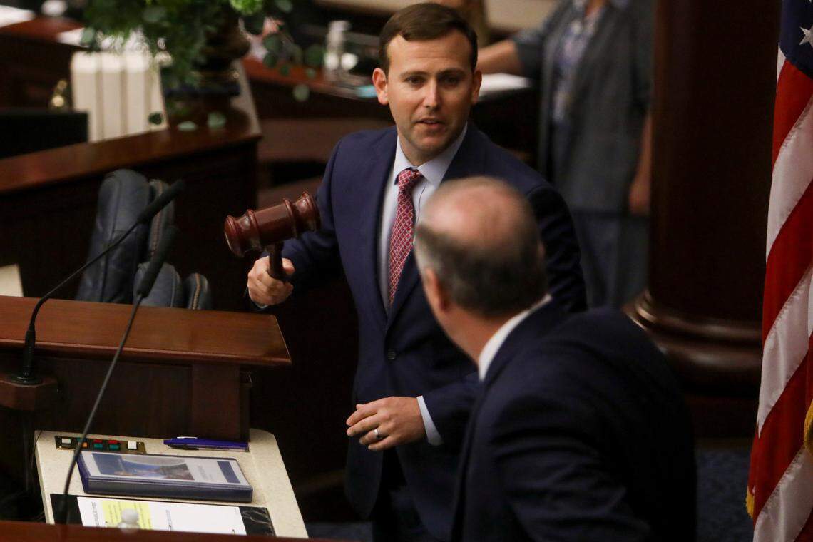 House Speaker Chris Sprowls, R-Palm Harbor, gives a gavel to Senate President Wilton Simpson, R-Spring Hill, ahead of a joint session at the Capitol in Tallahassee during Opening Day of the Florida Legislature on Tuesday, March 2, 2021.
