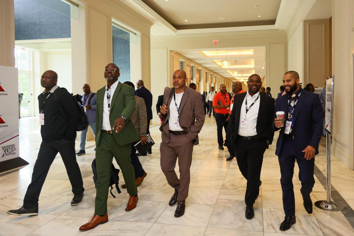 Conferencegoers attend the Black Men XCEL Summit at the JW Marriott Miami Turnberry Resort & Spa in Aventura, Florida, on Thursday, Nov. 7, 2024.
