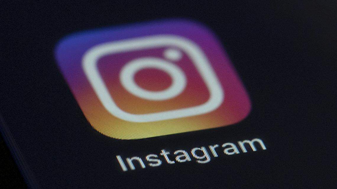 This 2019 file photo shows the Instagram app icon on the screen of a mobile device. The platform is rolling out new safety updates for younger users. (AP Photo/Jenny Kane, file)