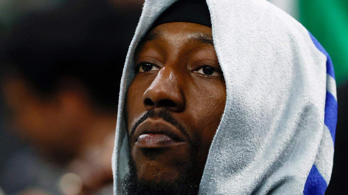 Miami Heat center Bam Adebayo (13) looks on from the bench during the fourth quarter of their 118-84 loss to the Boston Celtics in game five of the first round of the 2024 NBA playoffs at TD Garden.