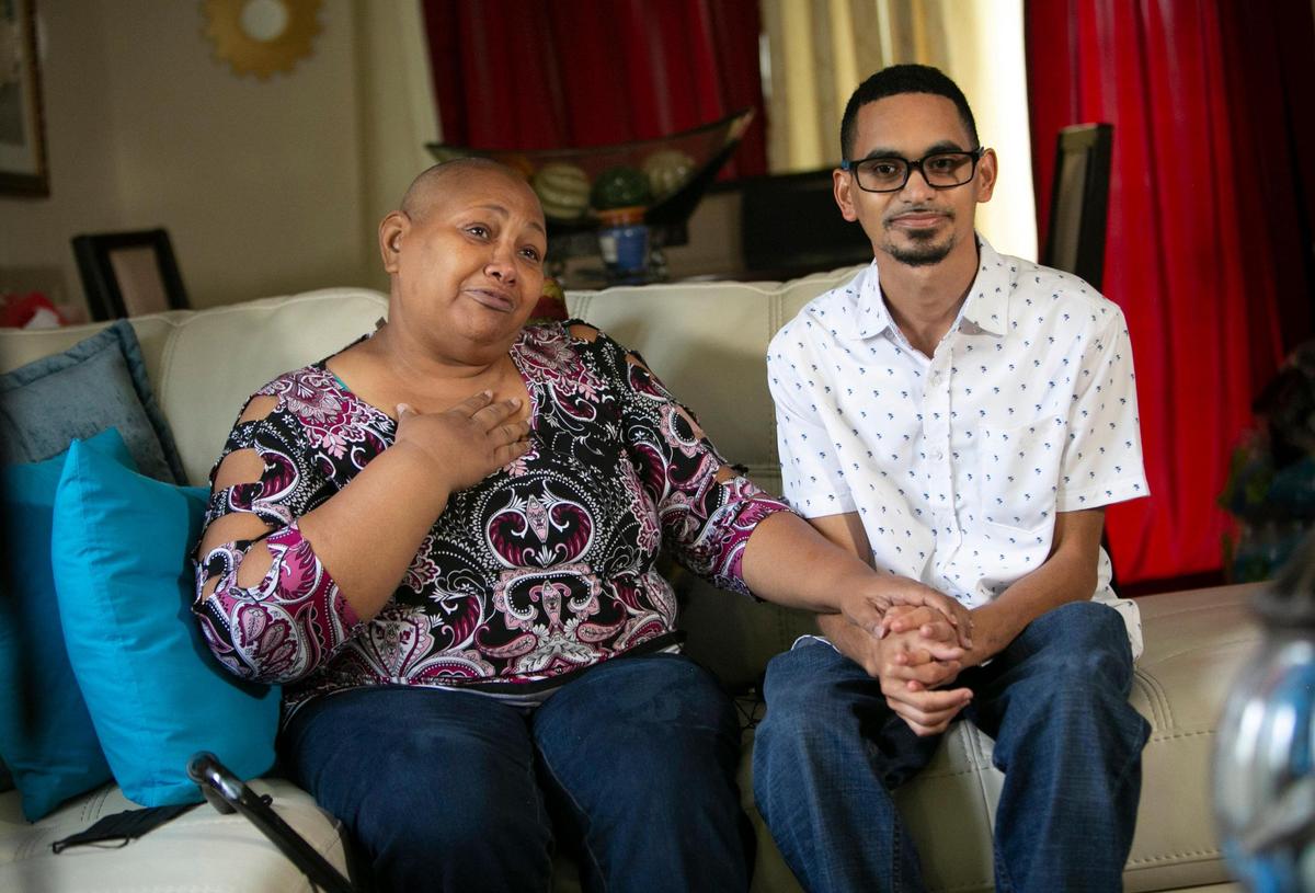 Maria Rosario, 55, is overcome with emotion talking about the generosity and kindness her son, Andre Amador, 29, shows to her, on Friday Nov. 19, 2021, in their Brownsville home.