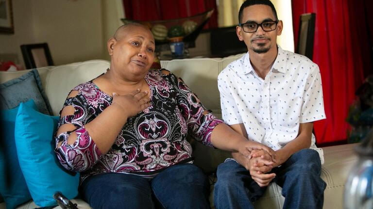 ‘I would never change him.’ Despite his disability, this son helps mom fight her cancer