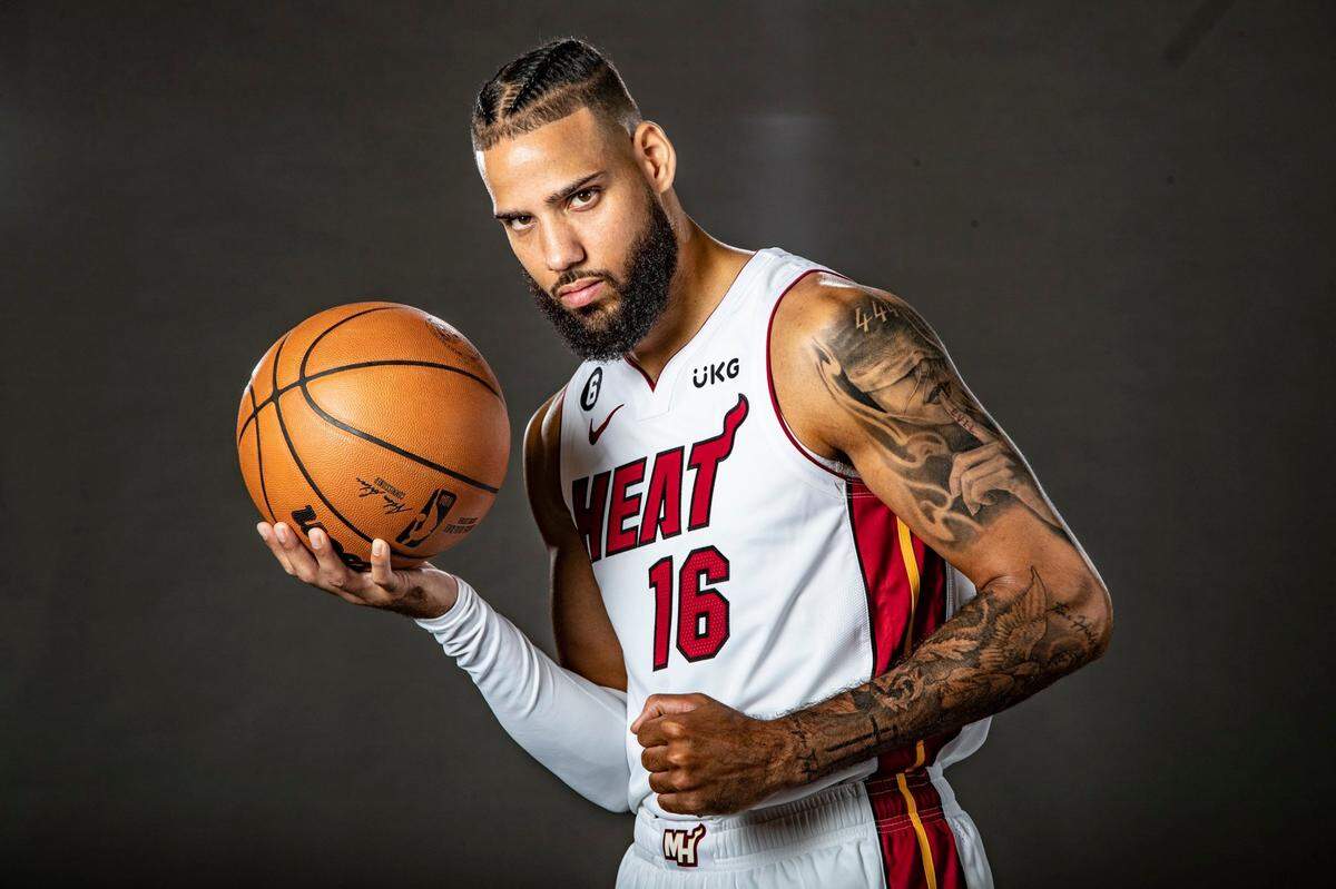 Miami Heat forward Caleb Martin (16) poses for a portrait during Miami Heat Media Day at FTX Arena in Miami on September 26, 2022.