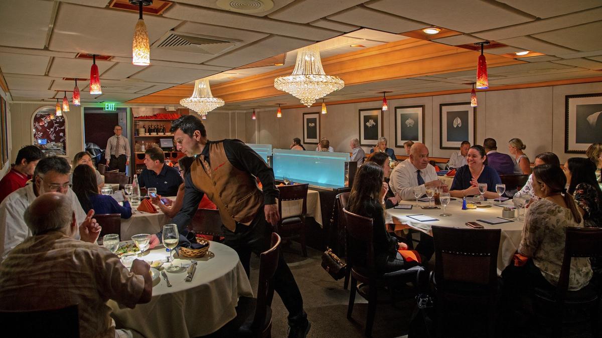The dining room at Caffe Abbracci in 2019. The Italian restaurant in Coral Gables is celebrating 35 years in the business two years after losing its beloved owner, Nino Pernetti.