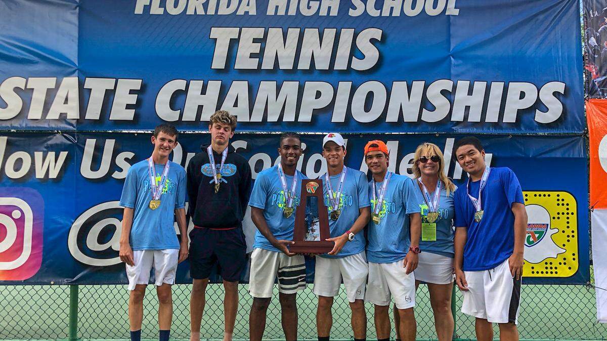 The Palmetto boys’ tennis team poses after winning the Class 4A team state title for the second consecutive season. Pictured, from left, are Cole Gibson, Daniel Martens, Randy Wilson, Matthew Fung, Ryan Fung, coach Kelly Gibson and Kevin Li.