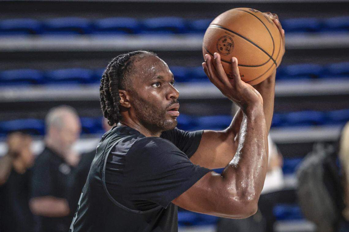 Miami Heat forward Precious Achiuwa (8) attempts a basket during practice drills during camp at Abessino Court at Eleanor R. Baldwin Arena at Florida Atlantic University in Boca Raton on October 2, 2025.