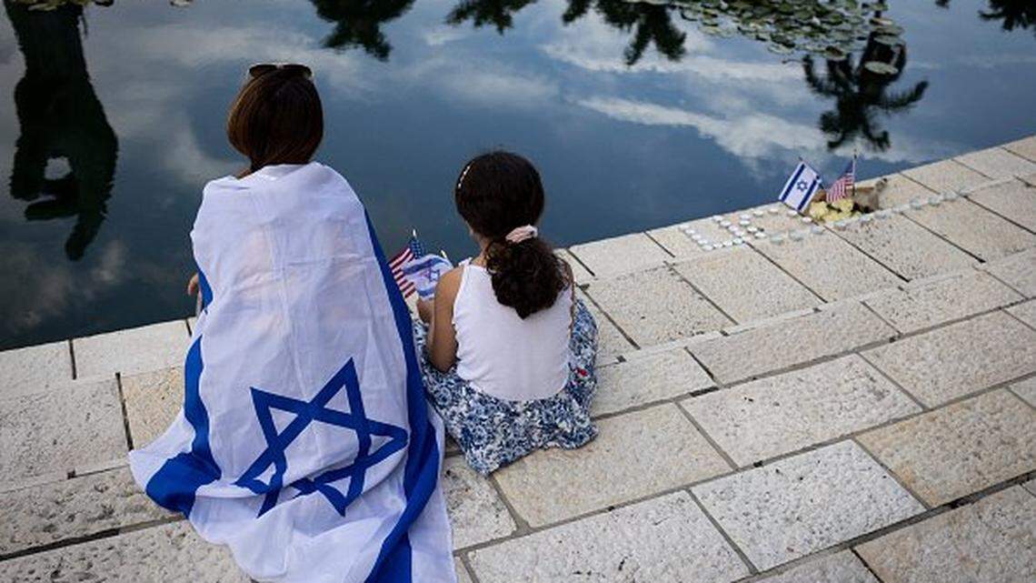 People attend the Israel Solidarity Rally organized by the Greater Miami Jewish Federation at the Holocaust Memorial in Miami Beach, Florida, on October 10, 2023. Israel said it recaptured Gaza border areas from Hamas on October 10, 2023, the fourth day of fierce fighting that has left thousands dead on both sides since the militants launched a surprise attack. (Photo by Marco BELLO / AFP) (Photo by MARCO BELLO/AFP via Getty Images)          