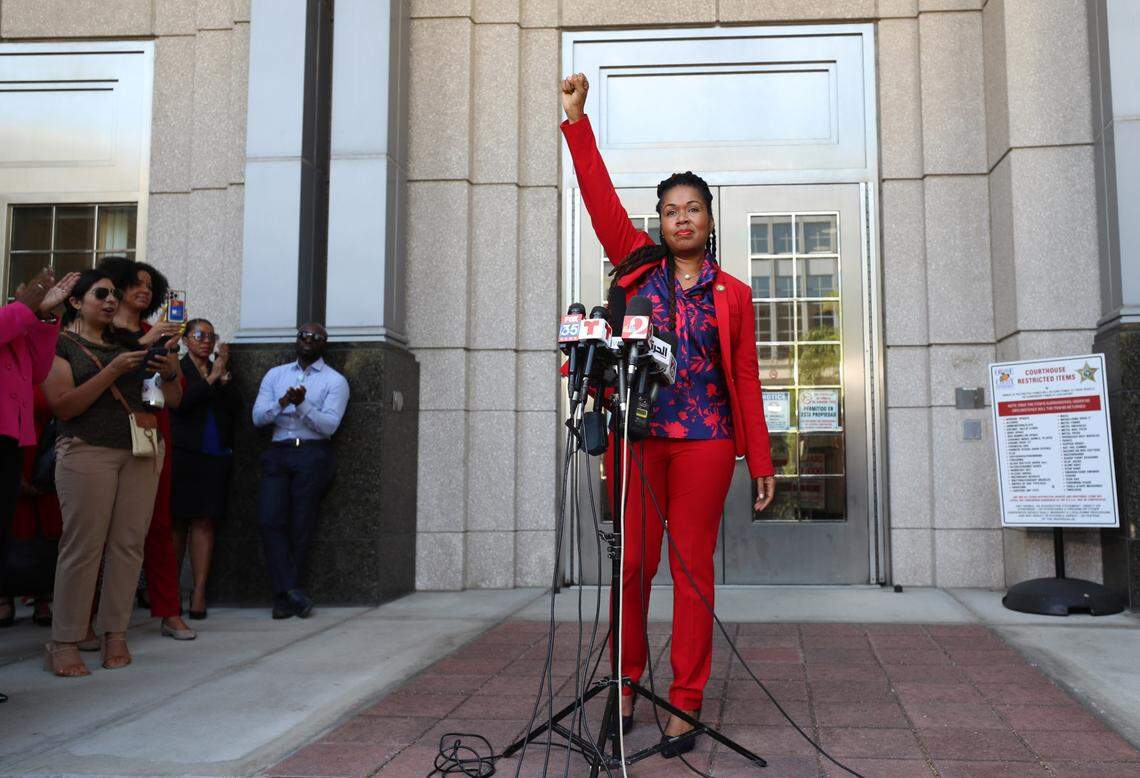 Monique Worrell ends her press conference with a raised fist outside her former office in the Orange County Courthouse complex, on Wednesday, August 9, 2023. Gov. Ron DeSantis on Tuesday announced the suspension of Orange-Osceola State Attorney Monique Worrell. At a press conference, DeSantis said Worrell and her office has been “clearly and constitutionally derelict” in her duty and said her policies justify her removal from office. Andrew A. Bain, a judge in Orange and Osceola counties, has been appointed by the governor.