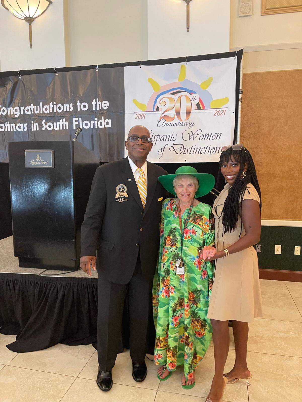 Willis Eubanks, Lynne Warrick and Cairo Eubanks celebrate Warrick’s Hispanic Women of Distinction Award in August. Warrick, 100 years old, is mentoring Cairo Eubanks, a former Miss Black Florida who is on a mission to teach others about protecting themselves from cyberbullying.