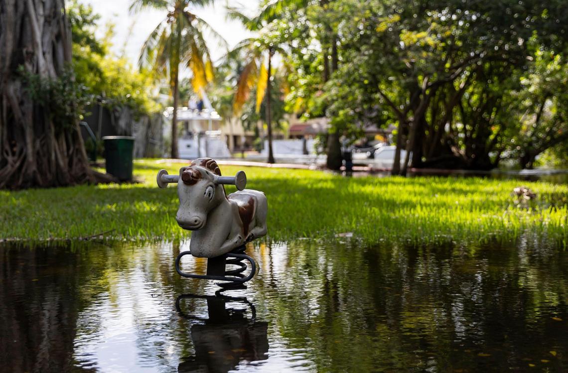 The playground at Little River Pocket Park floods on Monday, Oct. 30, 2023 in Miami, Fla. Monday was the highest king tide of the year for South Florida, flooding streets, driveways and parks.