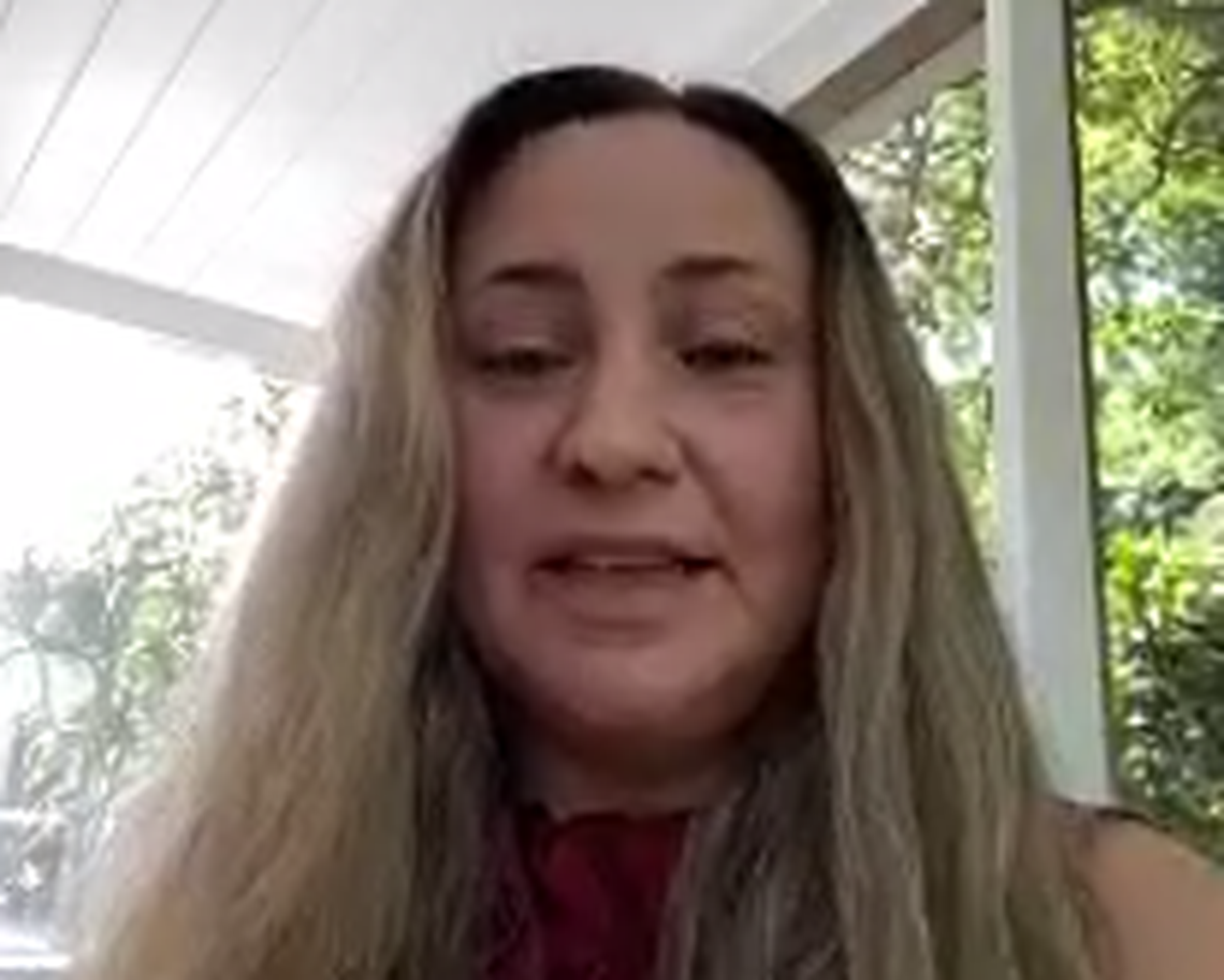 Kristina Hernandez is a medical technologist at Largo Medical Center. She says the surge in cases has left staffing low and her colleagues stressed and overworked.