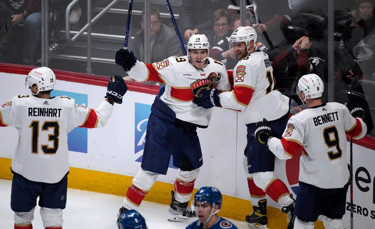 Florida Panthers left wing Matthew Tkachuk, second from left, celebrates his goal against the Colorado Avalanche with, from left, Sam Reinhart, Aleksander Barkov and Sam Bennett during the third period of an NHL hockey game Tuesday, Jan. 10, 2023, in Denver.