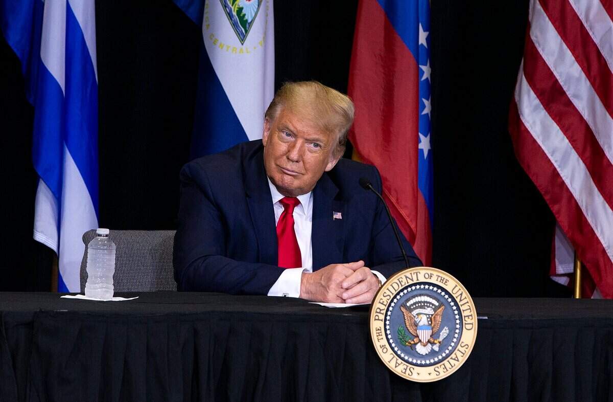 U.S. President Donald J. Trump listens as members of the Venezuelan and the Cuban exile communities talk about the situations in their countries under socialist regimes during a meeting at Iglesia Doral Jesus Worship Center after he visited the U.S. Southern Command in Doral on Friday, July 10, 2020.