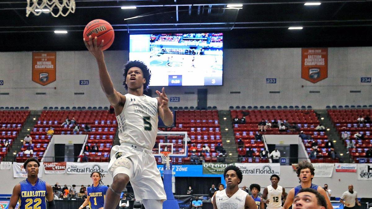 Mater Academy Jimel Lane (5) leaps for a basket as they play Charlotte in the FHSAA 6A Boy’s Basketball semifinals in Lakeland, Florida, Thursday, March 4, 2021.