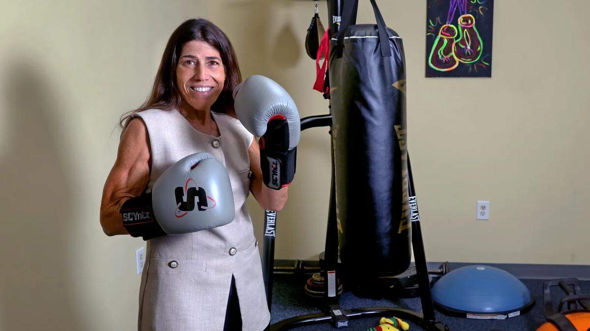 Anna Fusco, president of Broward Teachers Union, has a boxing heavy-bag setup in the hallway just outside of her office in Tamarac and works out in the mornings. Fusco said she has confidence the Broward Teachers Union will remain for the long haul despite a state law that makes it harder for them to remain active.