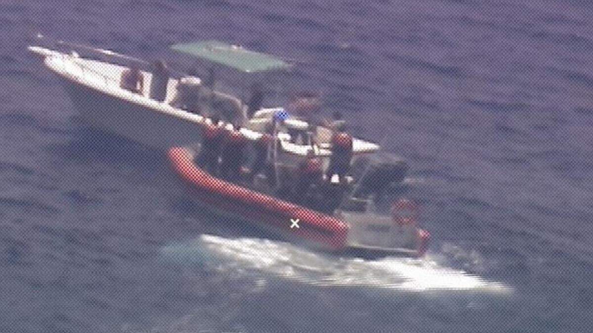 A Coast Guard Cutter Raymond Evans small boat crew approaches a 30-foot go-fast vessel with approximately 12 miles off of Villa Clara Province, Cuba, May 20, 2019. The Coast Guard Cutter Seahawk (WPB-87343) crew repatriated the 10 Cuban migrants back to their home of origin.