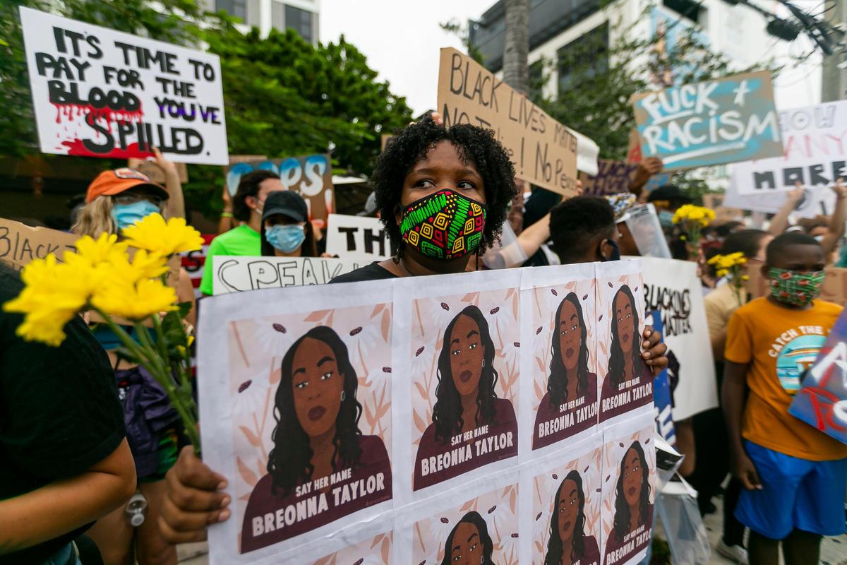 Christina St. Louis, 28, a North Miami Beach resident, participates in a Justice for George Floyd rally in MiamiÕs Wynwood neighborhood on Friday, June 5, 2020.