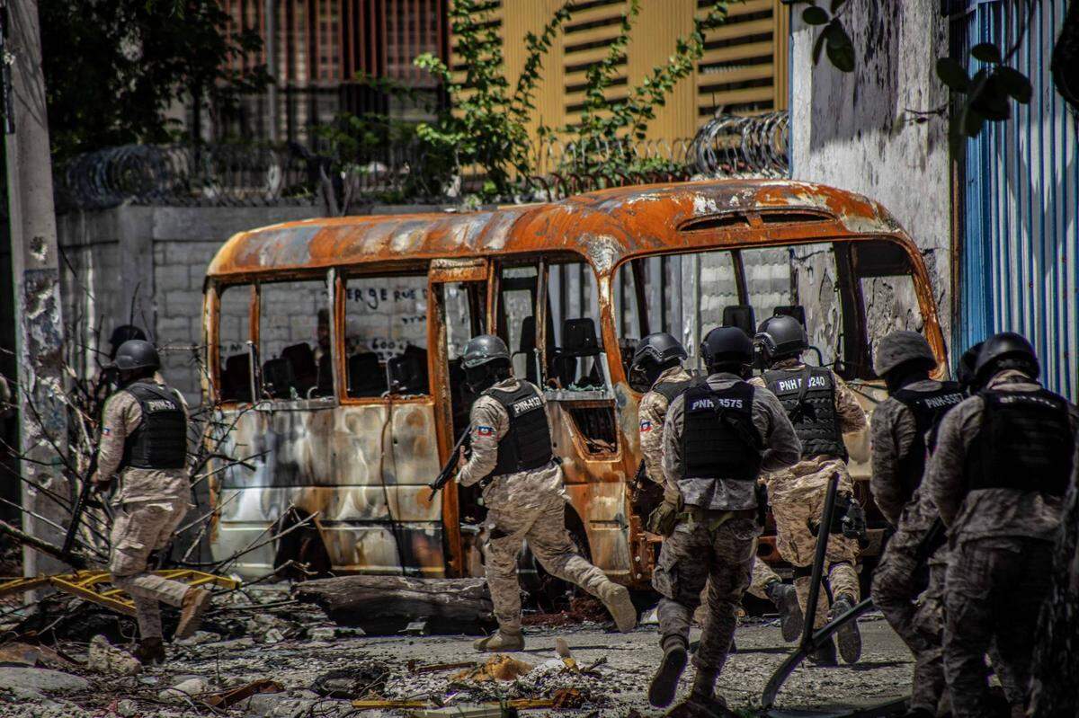 Haitian police patrol near the General Hospital after Haitian Prime Minister Garry Conille visited the facility in Port-au-Prince, Haiti, Tuesday, July 9, 2024.