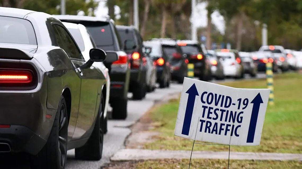 Drivers line up at a COVID-19 testing site in Orlando on Dec. 22.