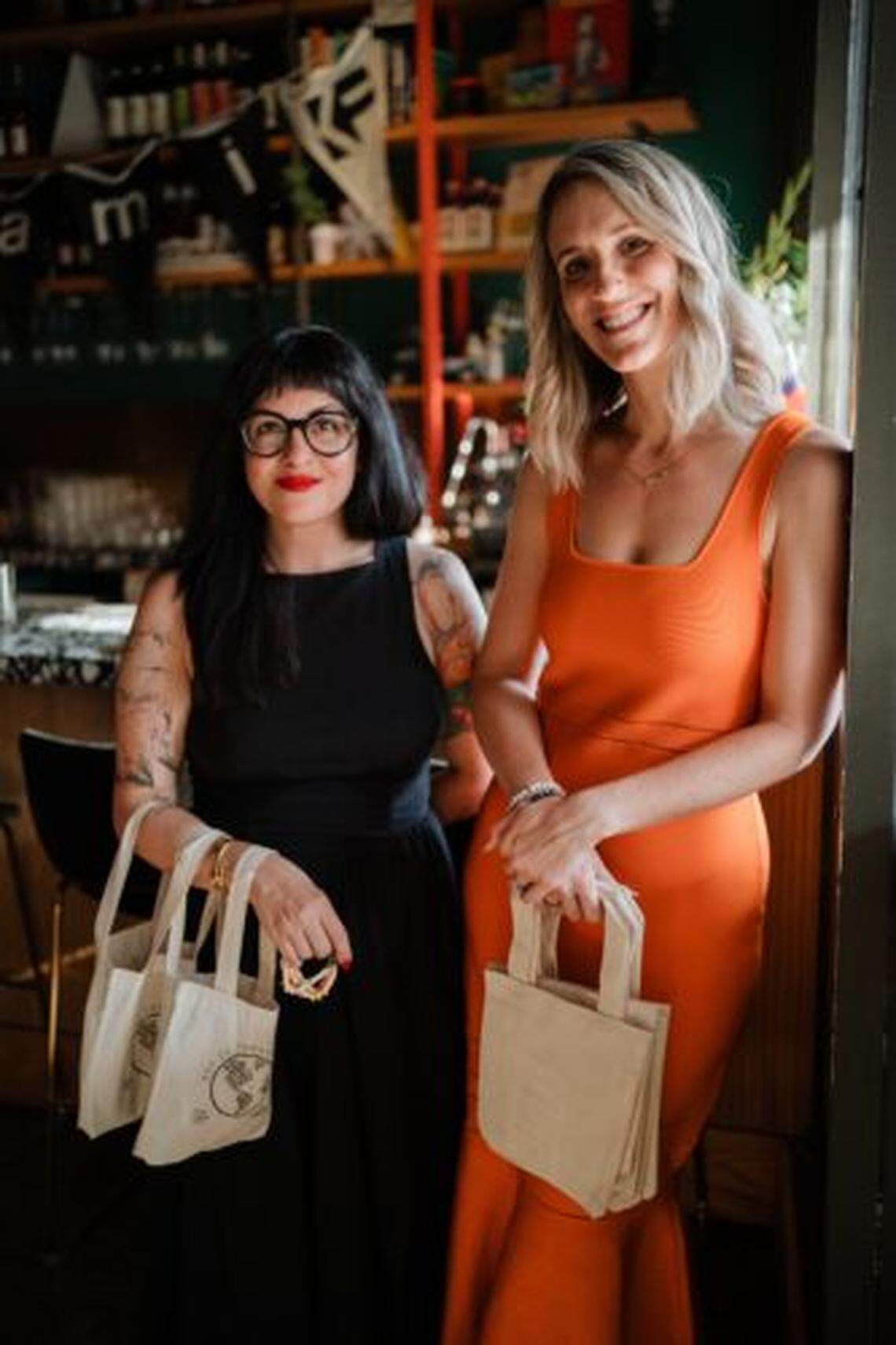 Melody Santiago Cummings, O, Miami’s executive director, left, with Artistic Director Caroline Cabrera at Poetry in Pajamas at Pinecrest Gardens.