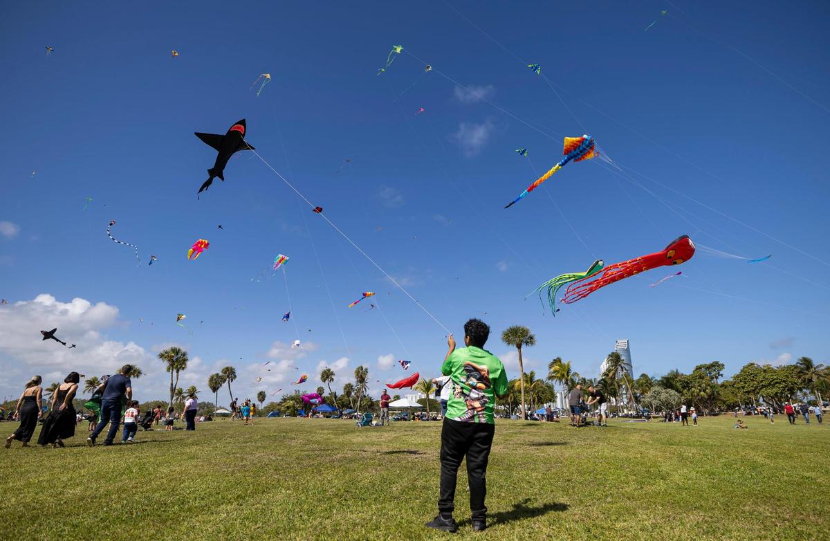 Fernando Mejia, 13, flies his kite during the 33rd Annual Kite Festival in Northeast Miami-Dade on Saturday, Feb. 15, 2025.