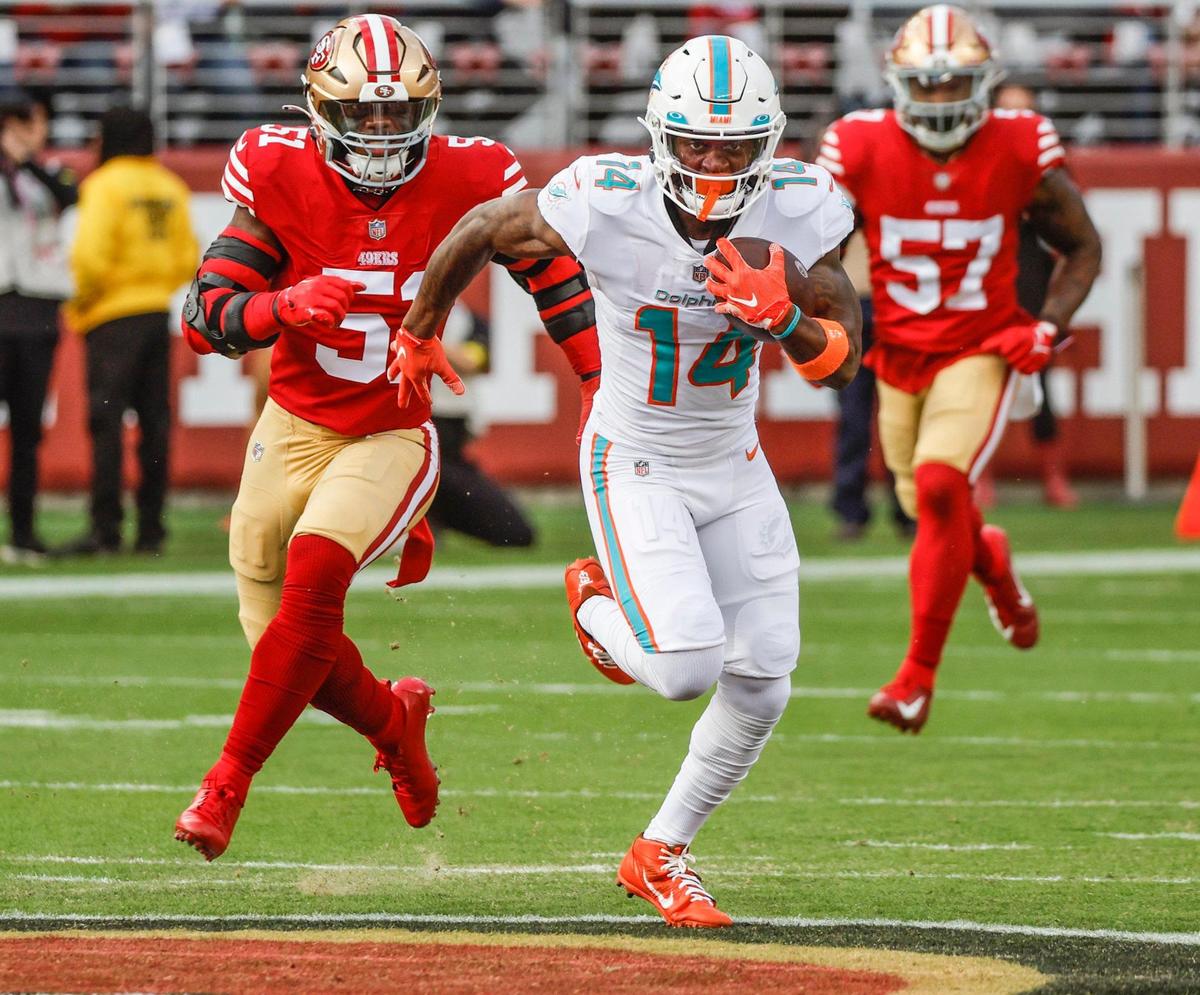 Miami Dolphins wide receiver Trent Sherfield (14) scores on a 75 yard reception in the first quarter against the San Francisco 49ers at Levi’s Stadium in Santa Clara, California on Sunday, December 4, 2022.