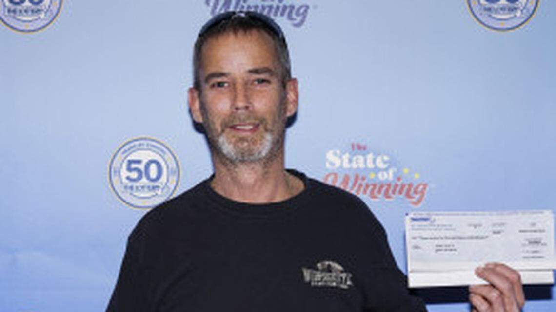 A man won a second $1 million lottery prize within two years in Massachusetts while picking up pizza. He bought both winning tickets from Town Food Mart.