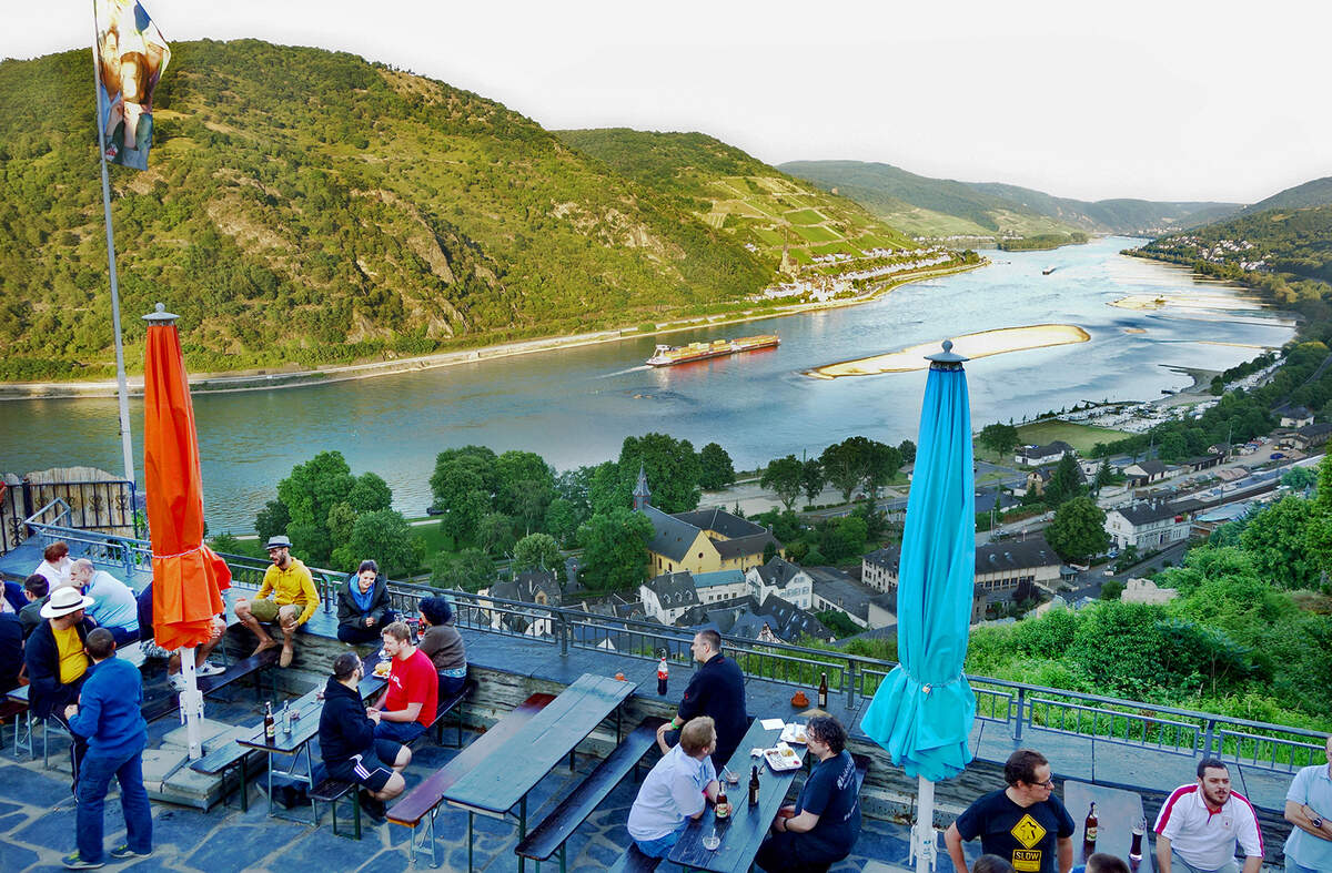 At Jugendherberge Stahleck, one of Europe's most scenic hostels, travelers sleep in a medieval German castle and enjoy a royal view of the Rhine River.
