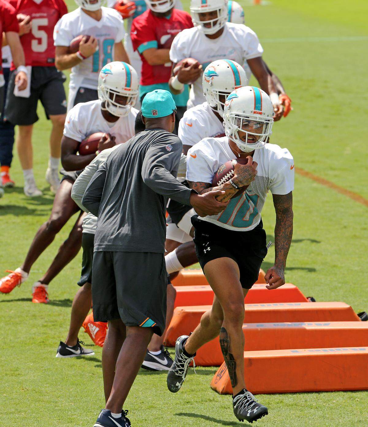 Miami Dolphins wide receiver Kenny Stills (10) runs drills during the Miami Dolphins Organized Team Activities at the Baptist Health Training Facility at Nova Southeastern University on Thursday, May 21, 2019 in Davie.