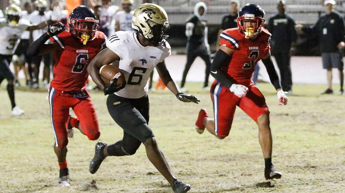 Western Wildcats running back Nelson Walker (6) scores a touchdown against Miramar Patriots during football game Friday, Nov. 5, 2021 at Miramar HS in Miramar. Andrew Uloza / for THE MIAMI HERALD